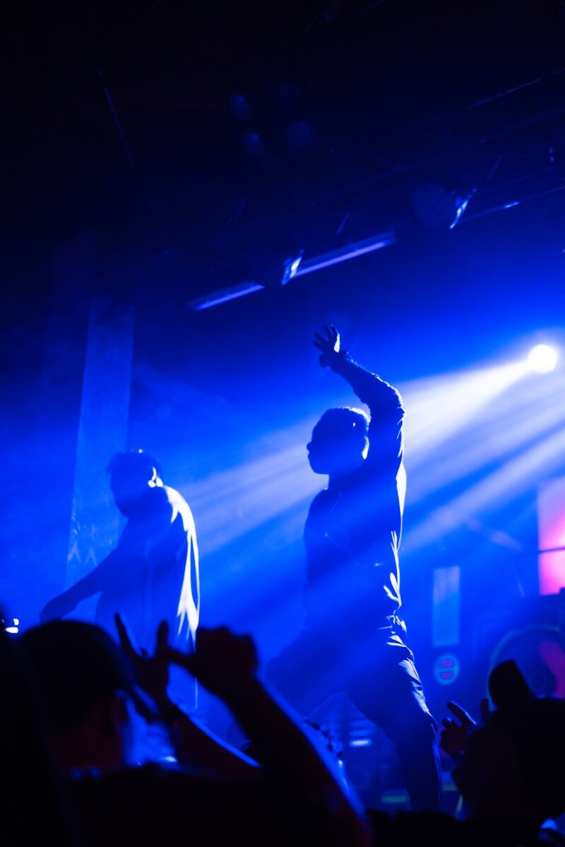 a group of people standing on top of a stage